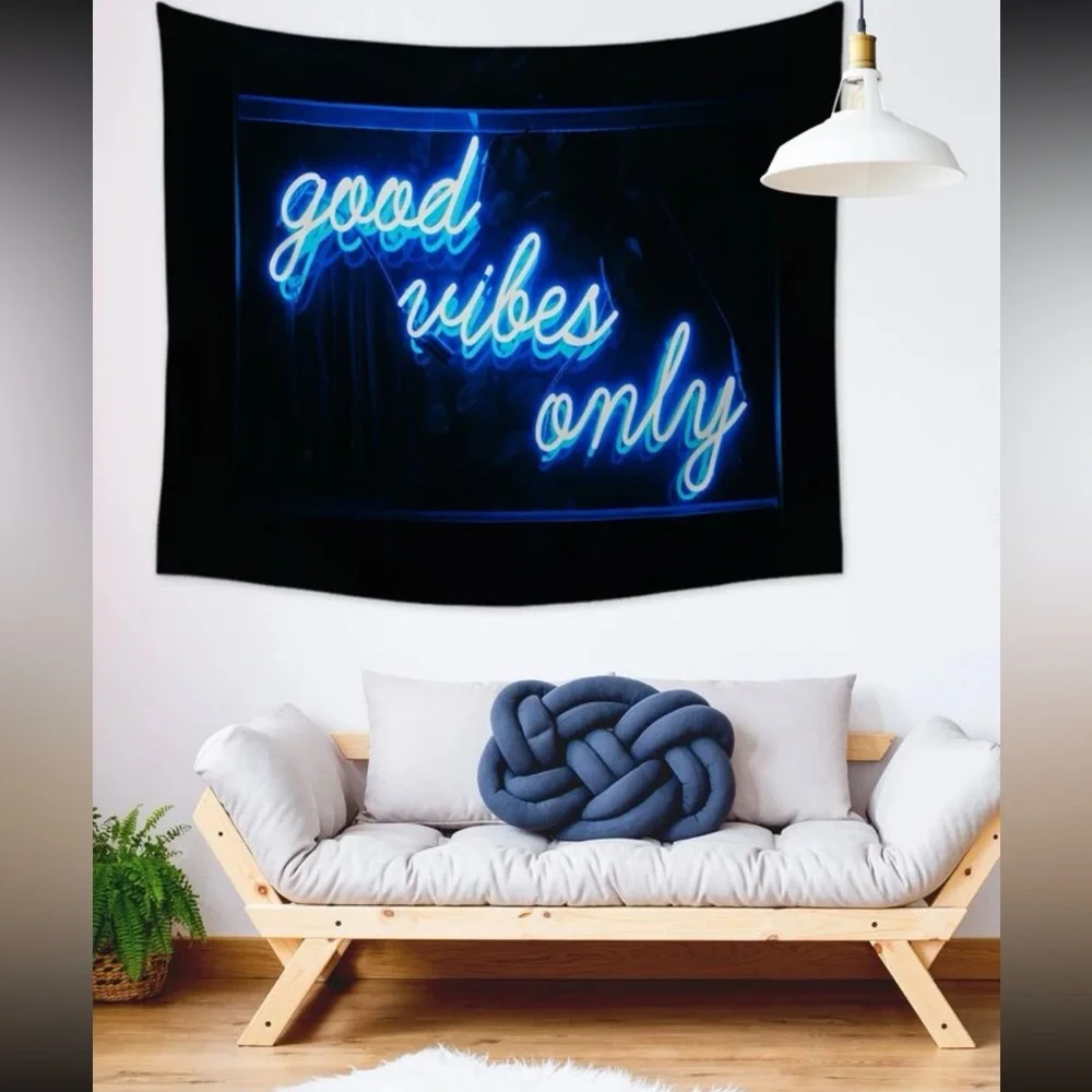 Black Tapestry with Blue Letters Graphic.